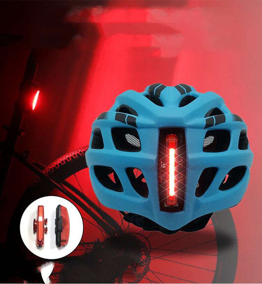 Bicycle helmet with taillight warning light glowing insect screen