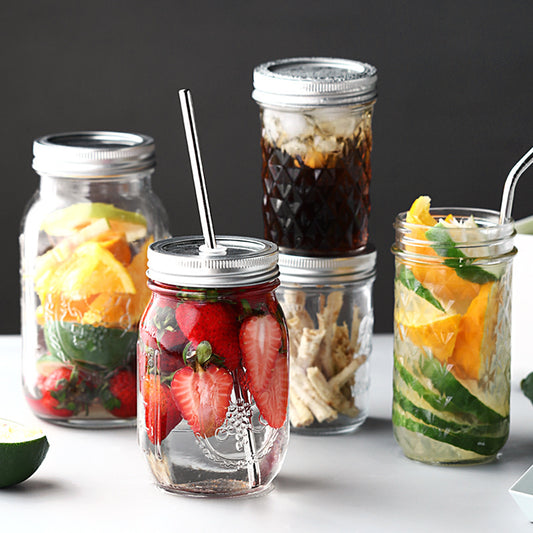 Clear glass mason jar with lid