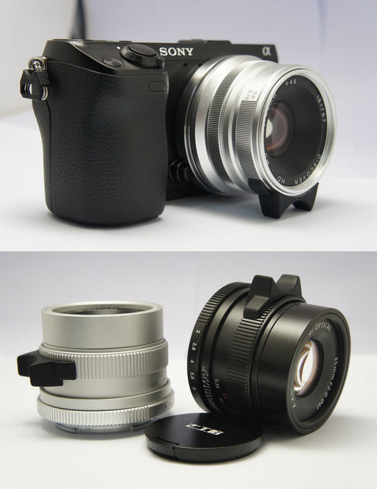 Manual lens focusing ring apron