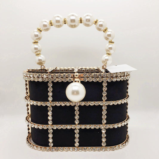 Hollow Pearl Buckle Birdcage Clutch